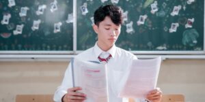 A pre-teen focused on a challenging task in a bright, modern room.