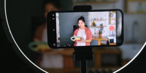 A smartphone showing a digital meal planner on a kitchen counter.