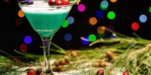 Elegant holiday table setting with sophisticated mocktails for an inclusive gathering.