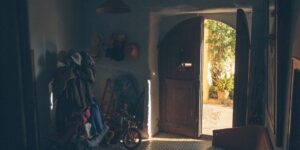 A calm, organized morning entryway with sunlight streaming in.