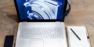 Tools and a smart baby monitor on a desk for repair