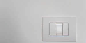 Modern smart home energy management system interface on a wall.