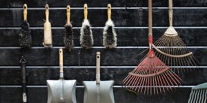 A well-organized community tool library featuring various gardening equipment.