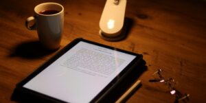 A peaceful Sunday evening desk setup with a tablet and tea, representing a calm transition to the week.