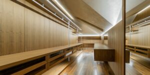 An organized luxury closet space representing the pre-owned market.