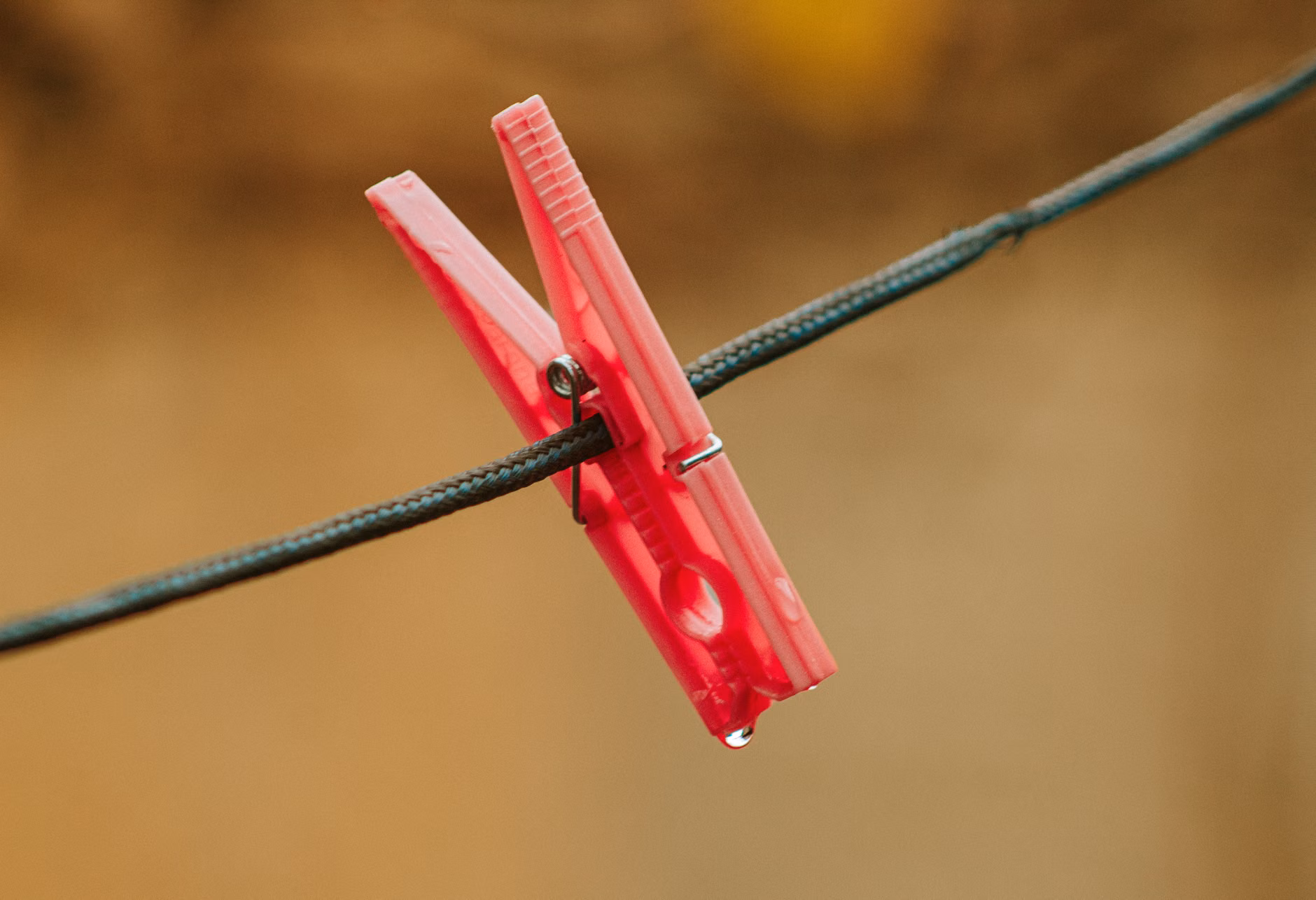Close-up of a DIY water flow sensor attached to household plumbing.