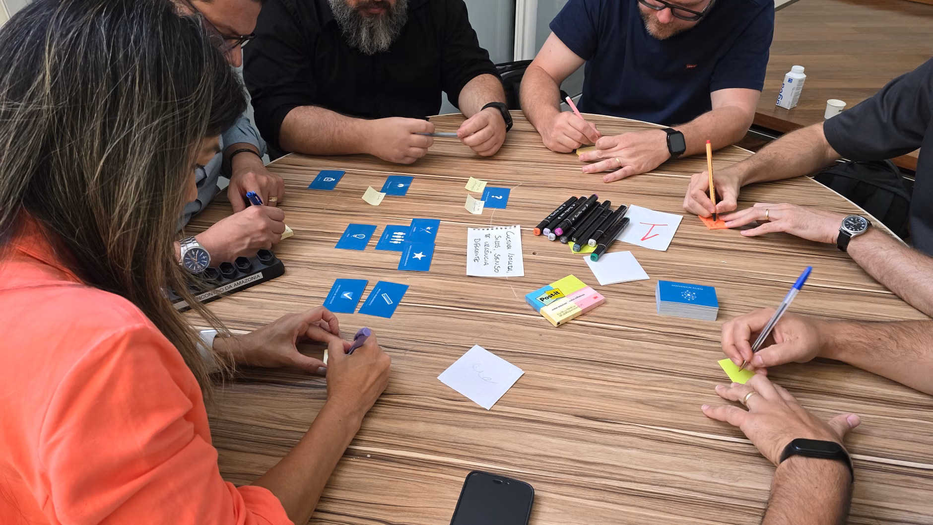 Adults participating in a collaborative workshop.