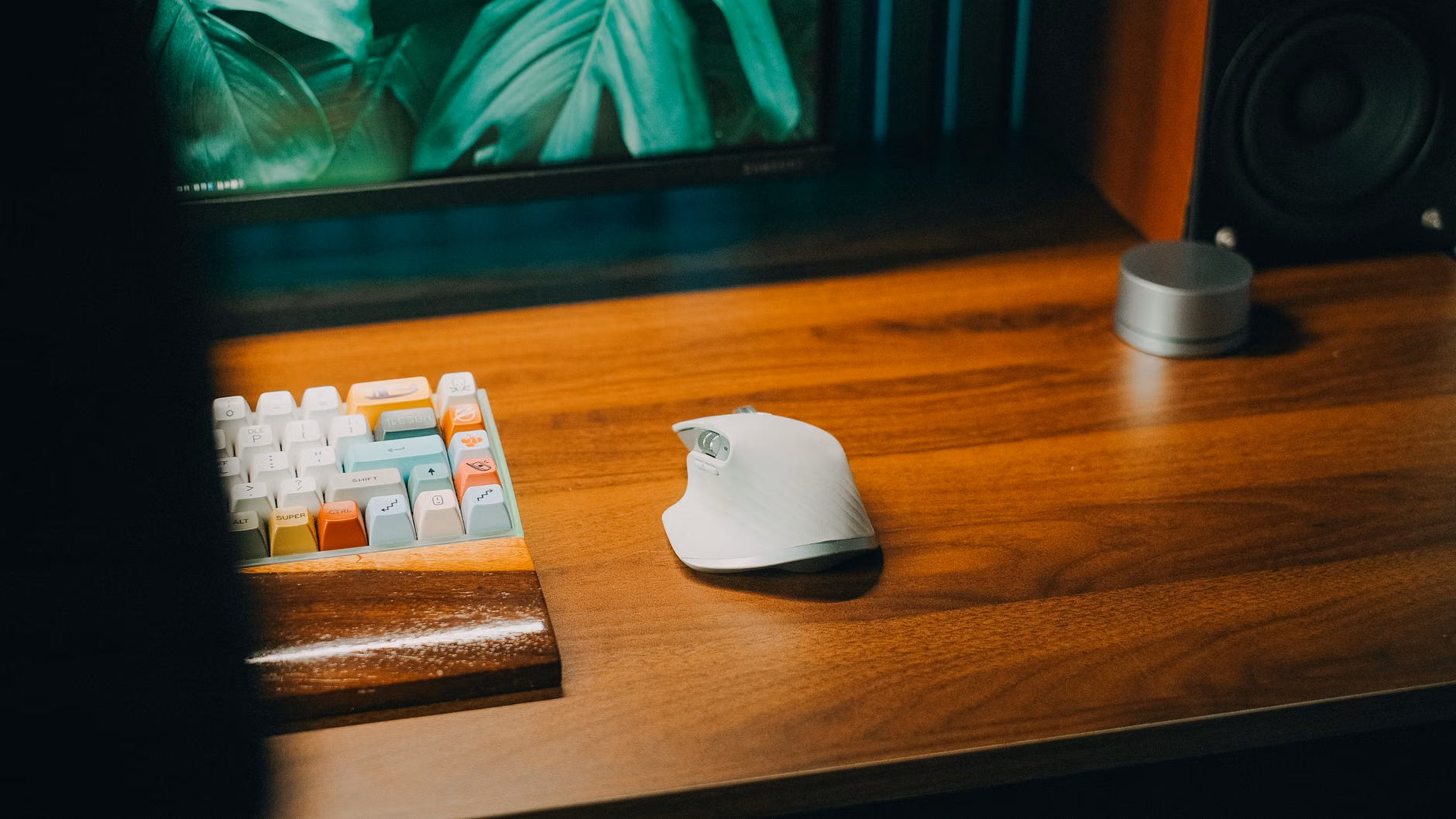 A desk featuring visual productivity tools and ergonomic accessories.