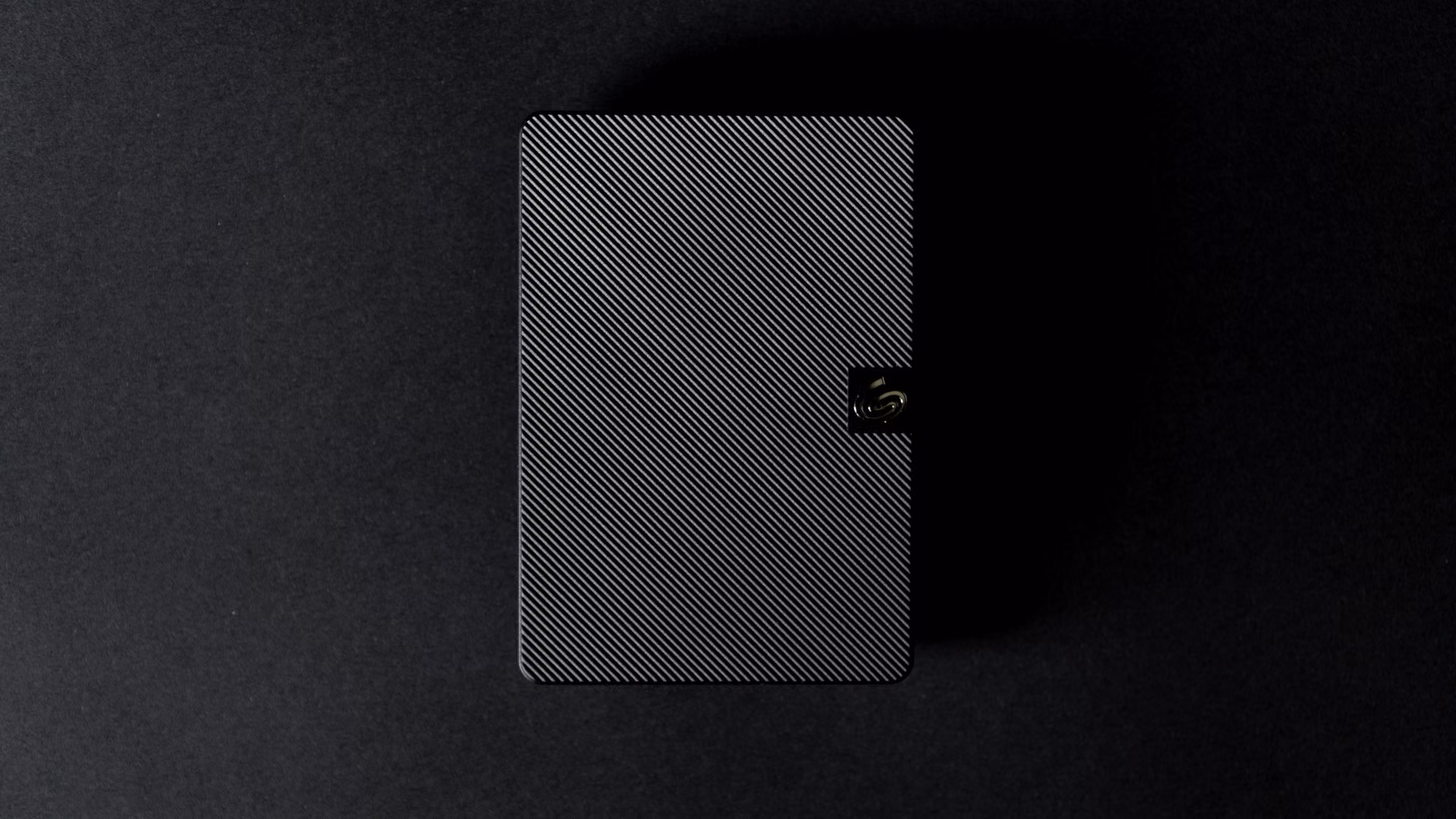 Close-up of an external hard drive for local backups.