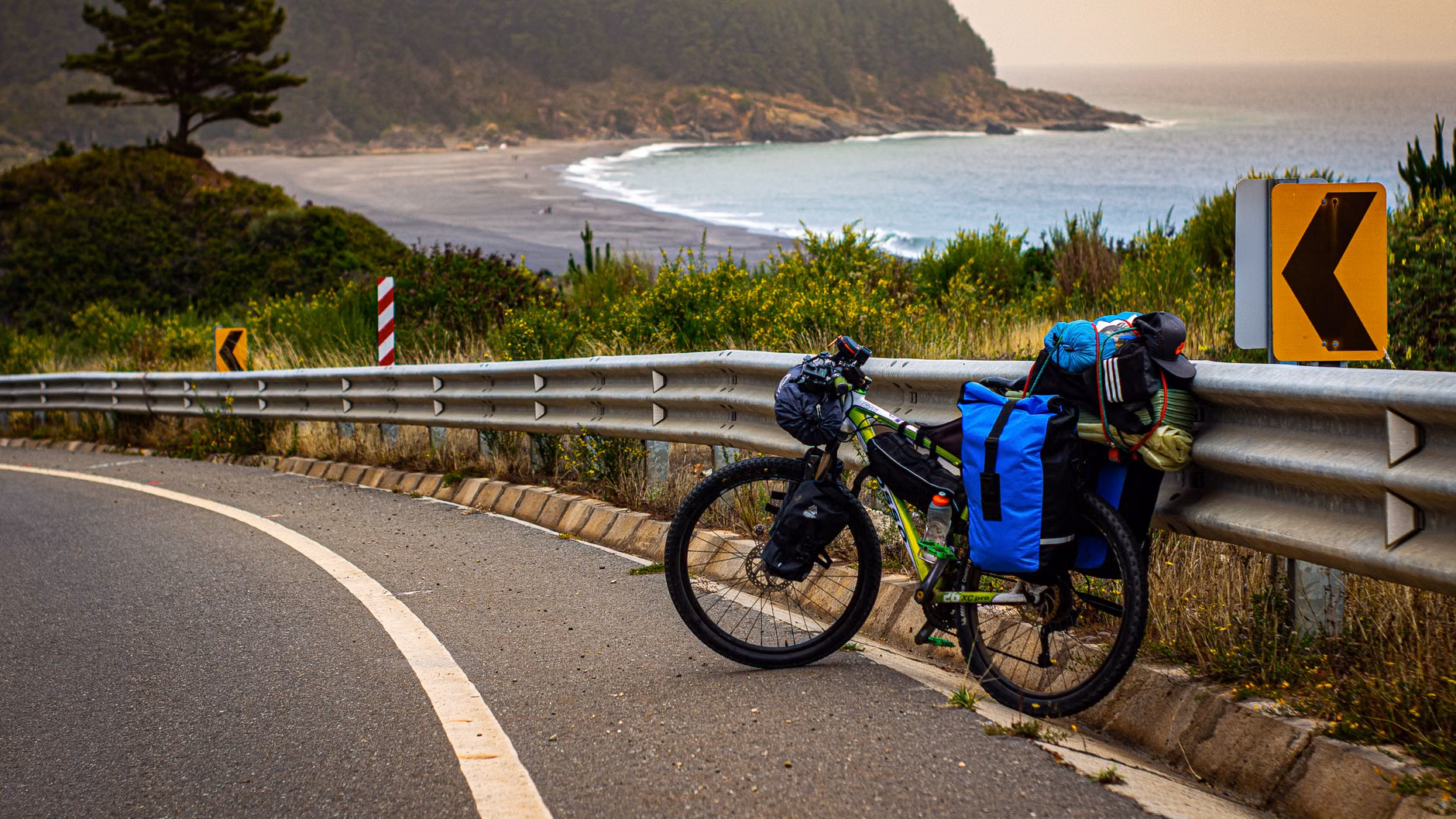Essential gear and snacks for a coastal cycling adventure.