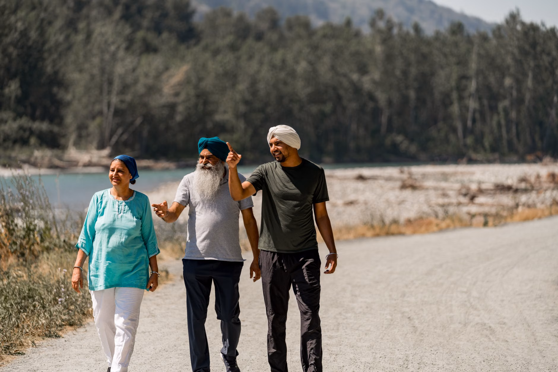 A family enjoying a gentle nature walk in a forest environment.