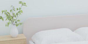A serene, minimalist bedroom designed for sensory regulation.