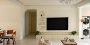 A versatile modular shelving unit in a bright, modern family home.