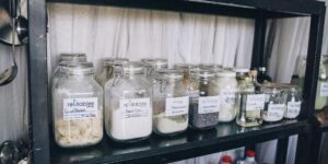 A neatly organized minimalist pantry with sustainable storage solutions.