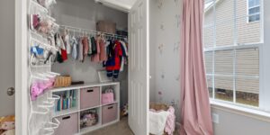 A clean, organized nursery closet featuring sustainable clothing options.