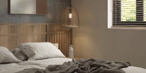 A calm, minimalist, and sensory-neutral bedroom interior with soft lighting and an organized aesthetic.