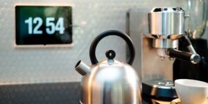 A modern kitchen setup with digital tools for managing household logistics.