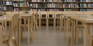 A clean, modern community tool library interior showing organized shelving.