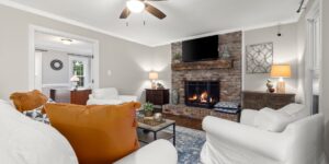A warm, inviting living room prepared for house swap guests.