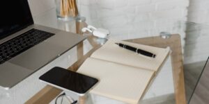 A minimalist desk setup representing organized co-parenting communication.