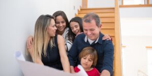 A modern family planning their next family activity with an exchange student.