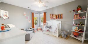 A bright, modern nursery featuring high-quality, durable baby furniture representing the luxury second-hand market.