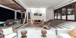A modern, organized vacation villa interior ready for a group arrival.