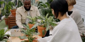 Diverse group of people gardening in an urban community space