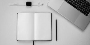 A clean, minimalist workspace setup for planning a weekend dopamine menu.