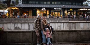 A family planning an experience-based outing together in a cozy home environment.