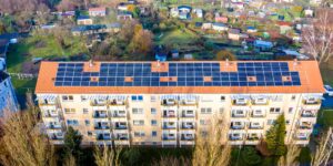 A compact solar power setup on an urban apartment balcony.