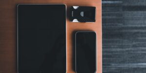 A smartphone on a desk representing a parent's approach to digital security.